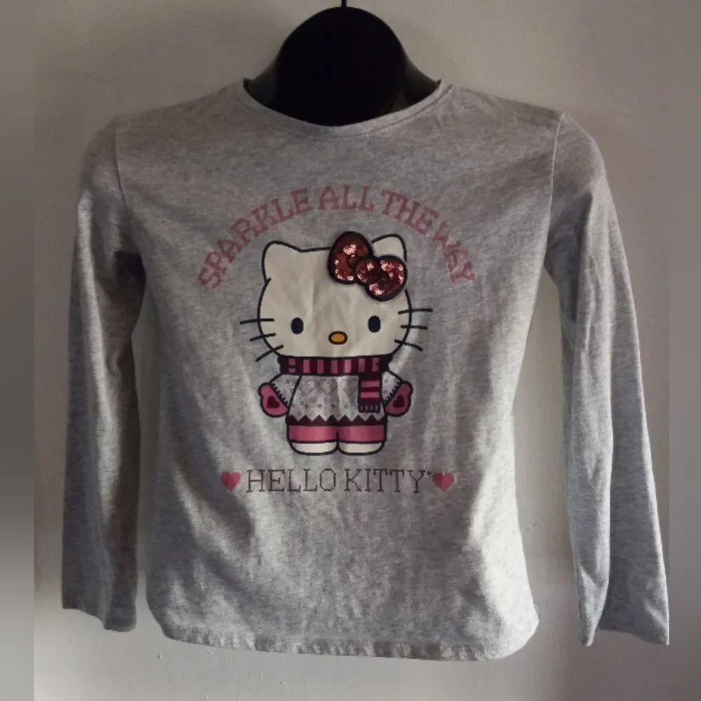 Hello Kitty Sparkle All the Way Sequin Bow Size 10